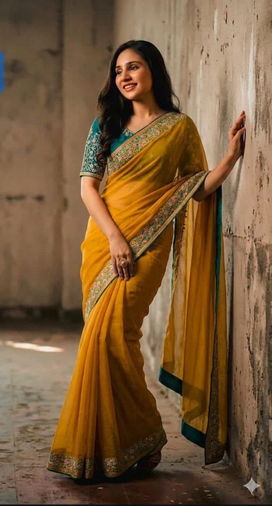 Mustard Yellow Georgette Saree with Teal Embroidered Border